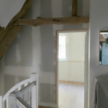 Réaménagement intérieur avec modification du parquet et de l’escalier à Saint-Léger-du-Bourg-Denis
